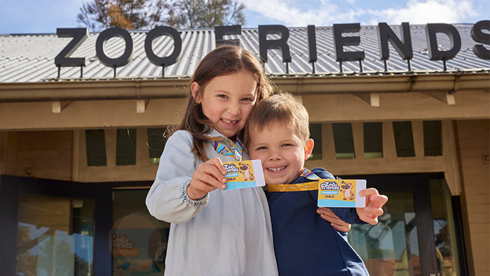 Zoo Friends members holding lanyards 